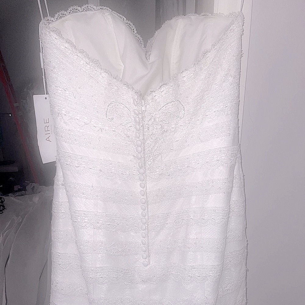 NWT designer wedding dress. Bought from “The White Dress” size 10 never altered - Picture 5 of 16